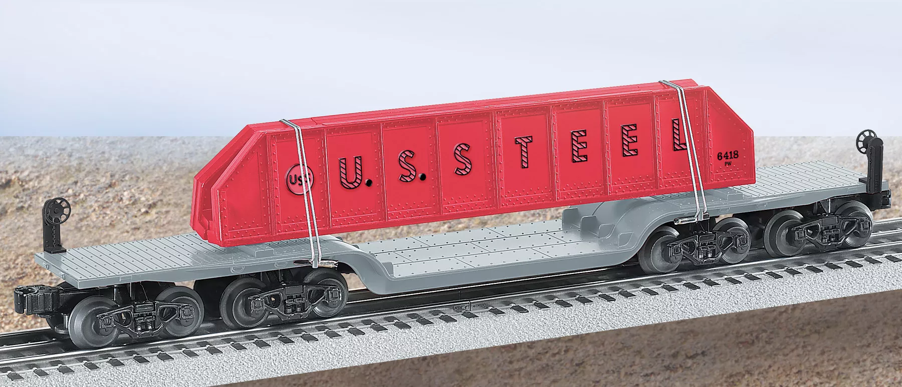 #6418 U. S. Steel Sixteen Wheel Die-Cast Flatcar w/ Girder Load